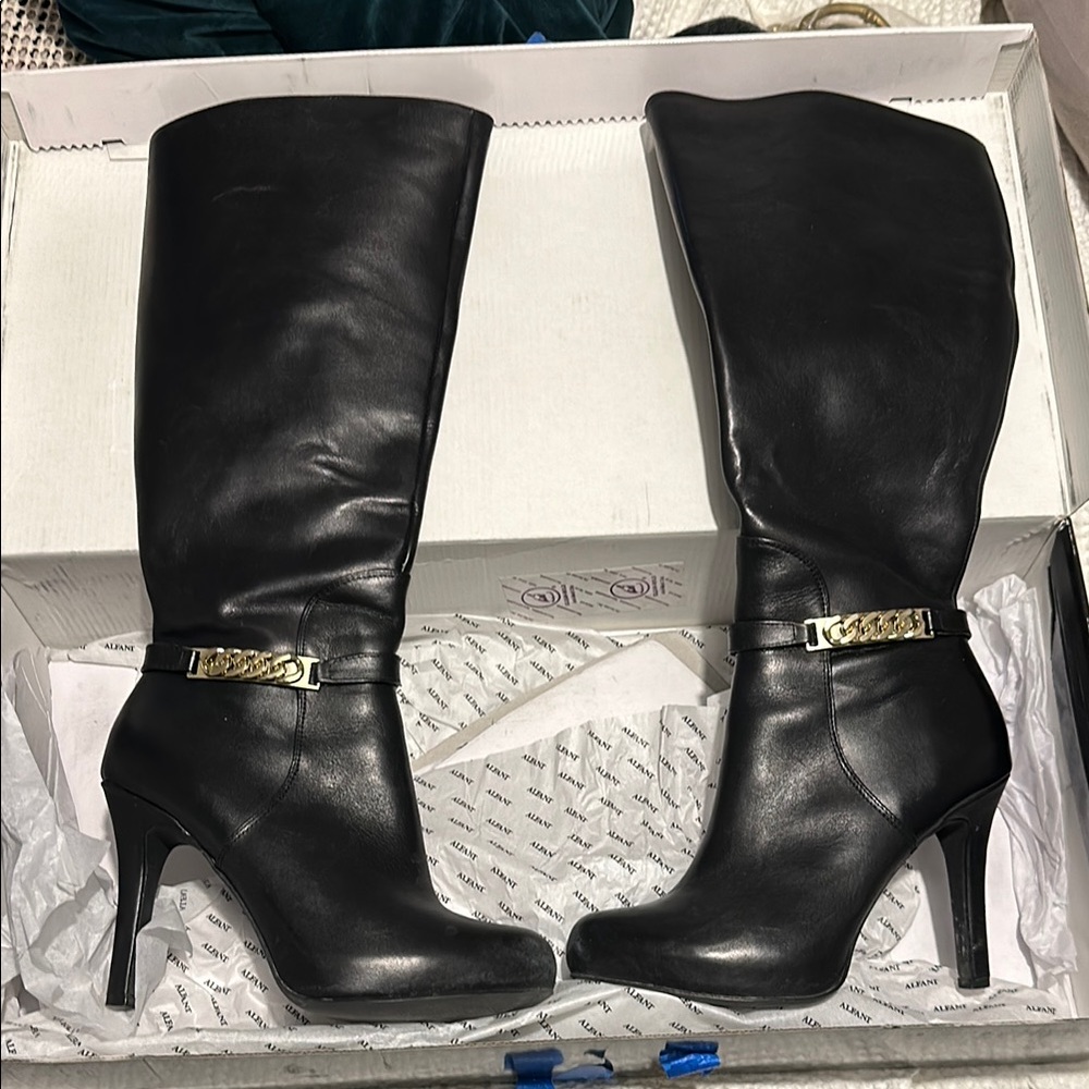 Chic Black Leather Knee-High Boots with Gold Accent